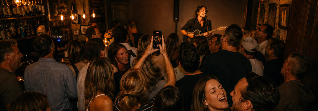 Marcel Rosado (Marcel Acoustic) performing at a bar in Atlanta.